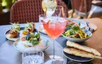 Set table with starters and drinks 