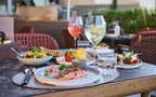 Set table with starters and drinks