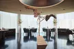 inside area of Restaurant Ikarus with Ikarus sculpture