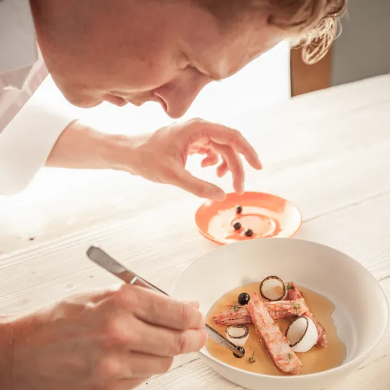 Martin Klein prepares a dish