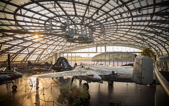 Interior view of Hangar-7 showing its glass-and-steel architecture and exhibits in the exhibition