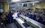 Ikarus team group image in the kitchen 