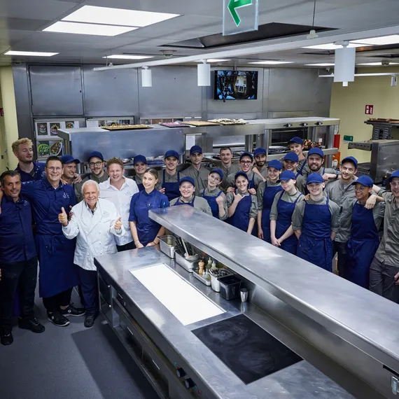Ikarus team group image in the kitchen 