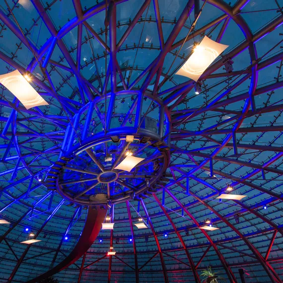 Threesixty Bar illuminated in red and blue