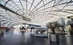 Interior view of Hangar-7 showing its glass-and-steel architecture and exhibits in the exhibition