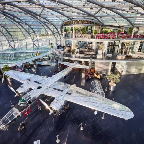 Interior view of Hangar-7 showing its glass-and-steel architecture and exhibits in the exhibition