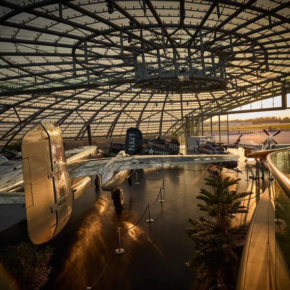 Interior view of Hangar-7 showing its glass-and-steel architecture and exhibits in the exhibition